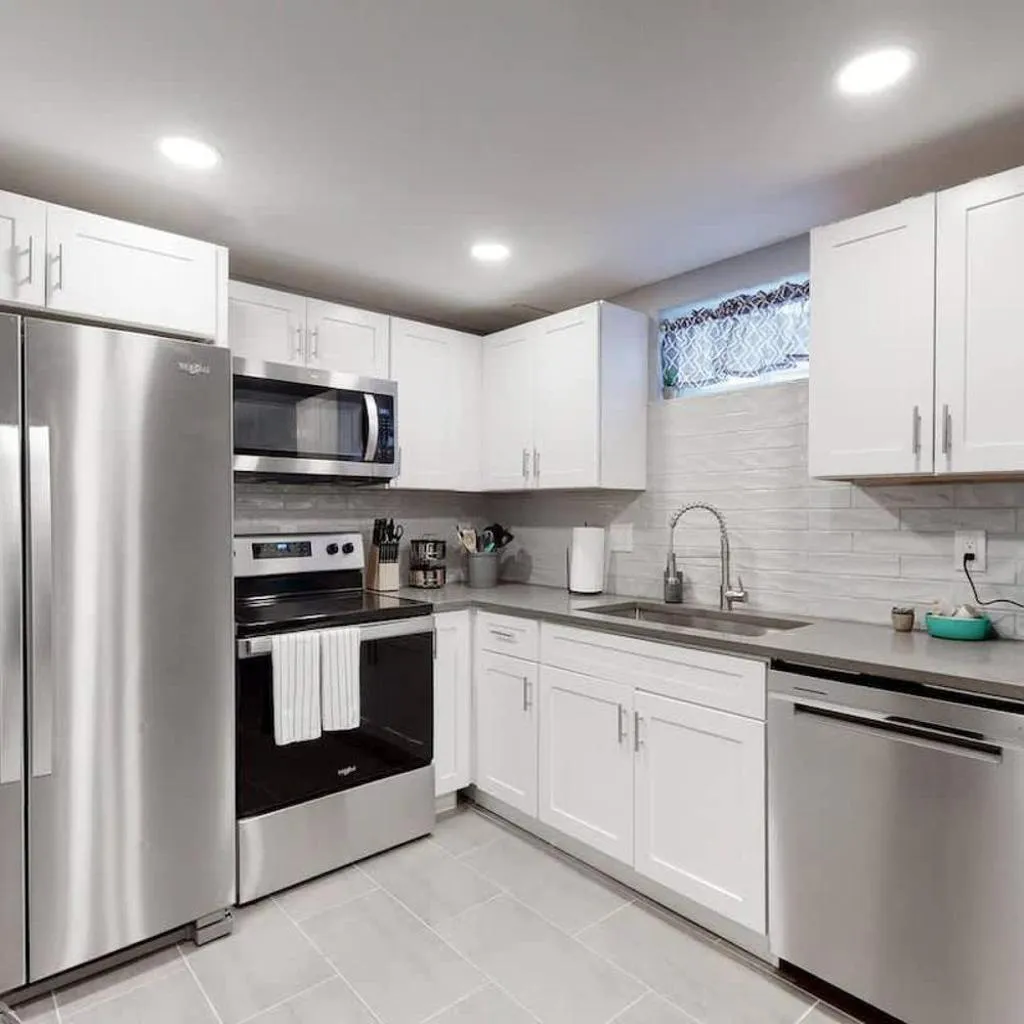 Photograph of Bright basement unit with large yard and sunroom