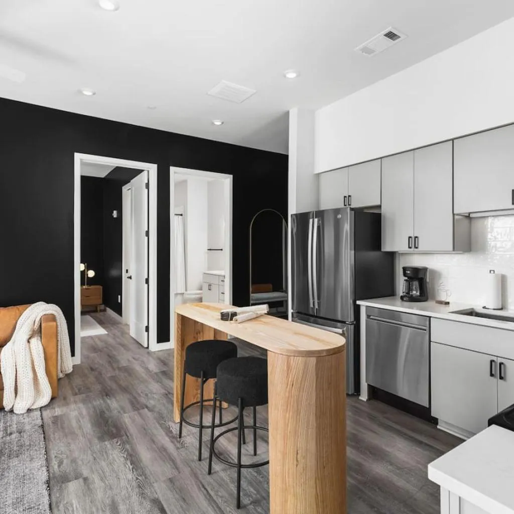 Photograph of Chic Music Row Condo Rooftop Deck with City View Gym Office and More