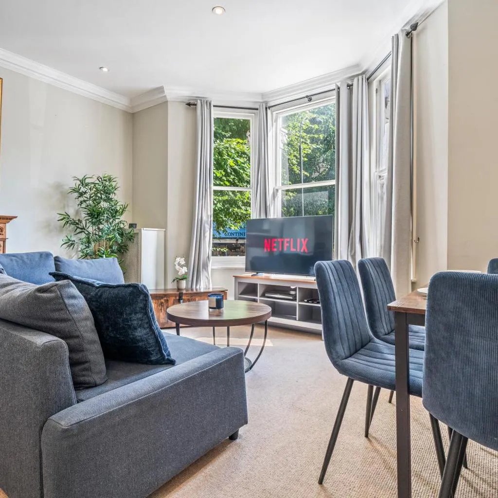 Photograph of Charming 2 Bedroom Retreat, Steps from Station,