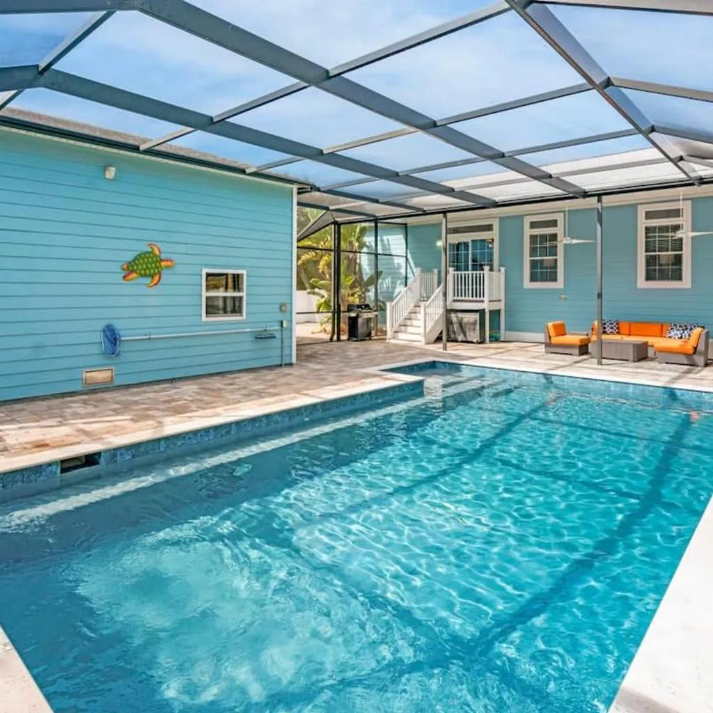 Photograph of Sparkling Blue Pool Home! Walk to Beach, Publix