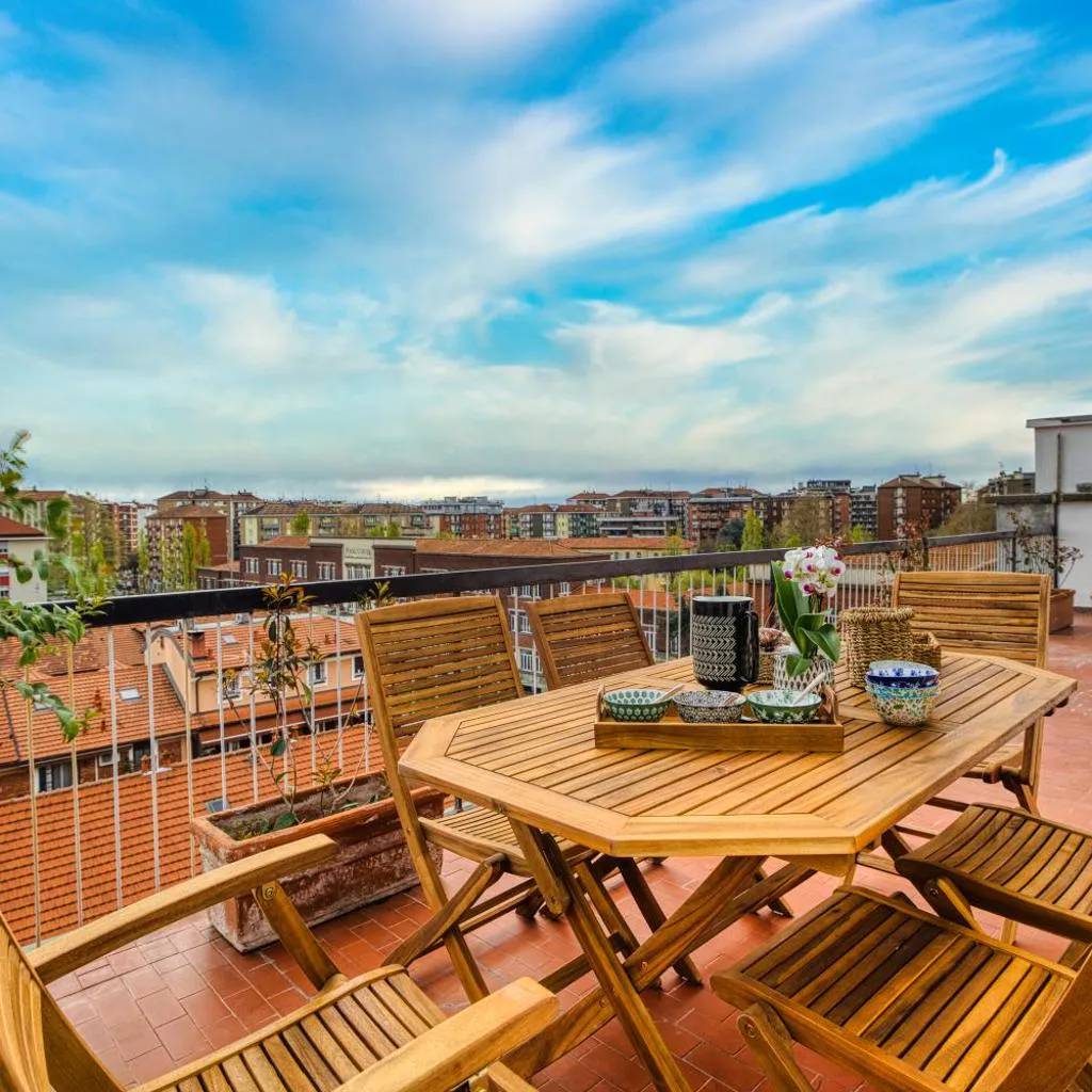 Photograph of Top-floor Penthouse with panoramic terrace - 20 minutes from San Siro & Duomo