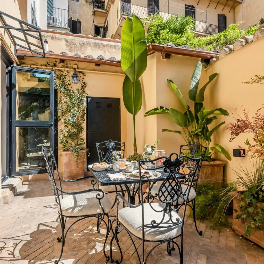 Photograph of Colosseum 1 Min Design Apt with Private Courtyard