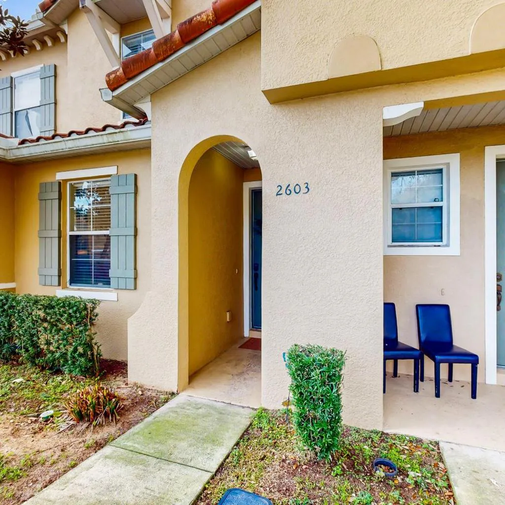 Photograph of Dog-friendly townhouse near Disney with outdoor pool, patio, streaming, W/D, AC