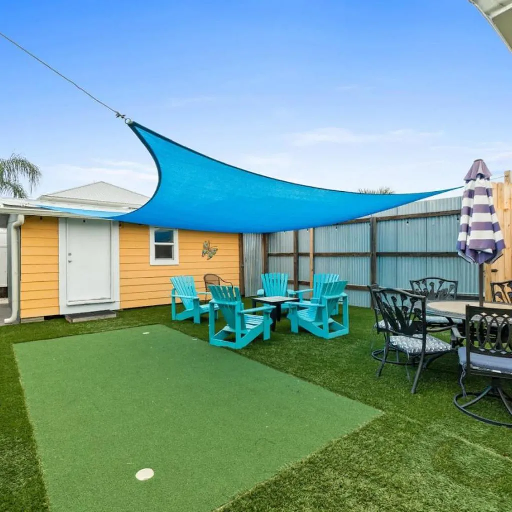Photograph of Spacious Dog-Friendly Unit with Game Room & Private Yard, Walk to East PCB Beach