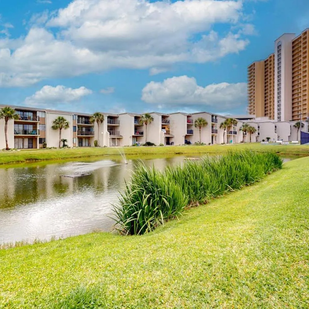 Photograph of Charming dog friendly condo with a pool tennis beach access plus washer and dryer