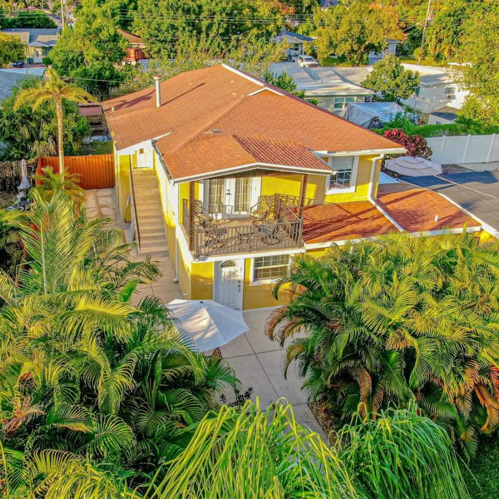 Photograph of Tropical escape with fire pit near airport & stadium