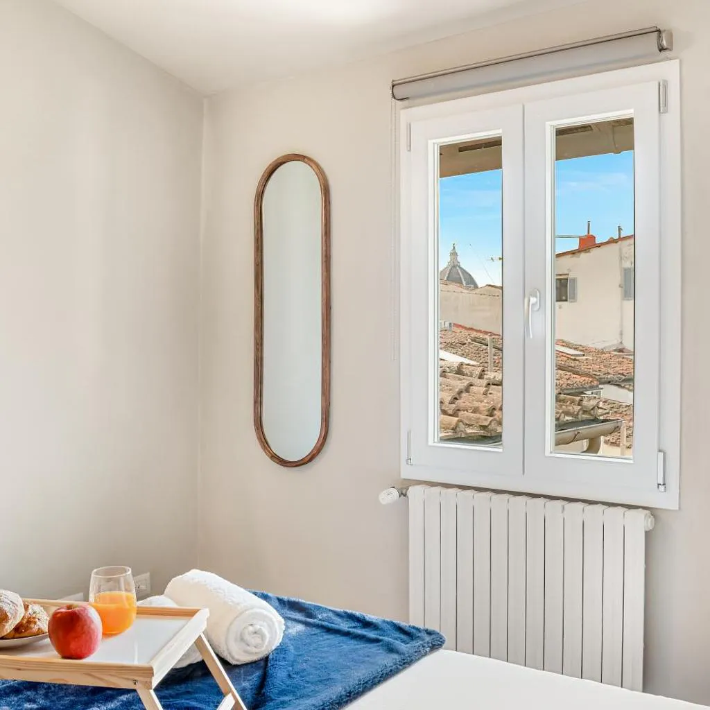 Photograph of GOLDEN LUXE - Penthouse Raffaello con splendida vista cupola