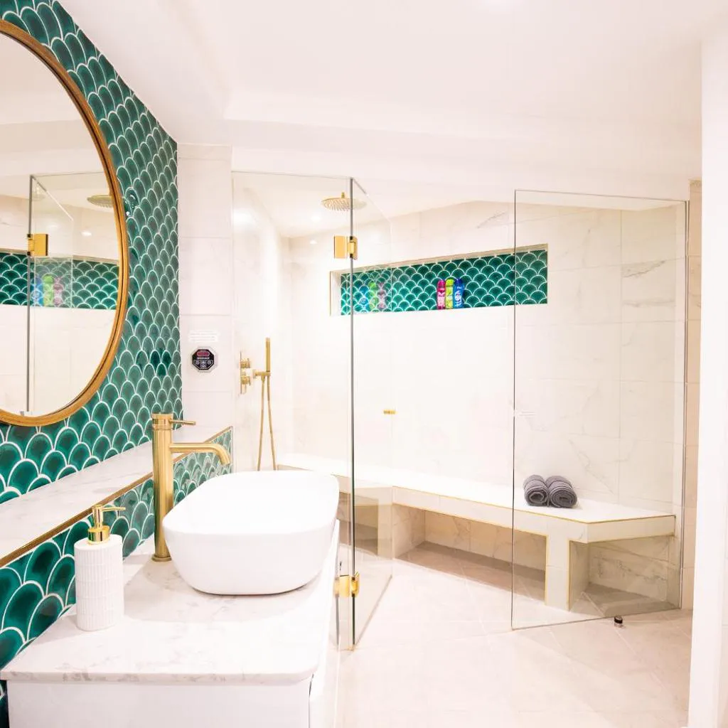Photograph of Hidden Retreat with Steam room, KING bed near tube