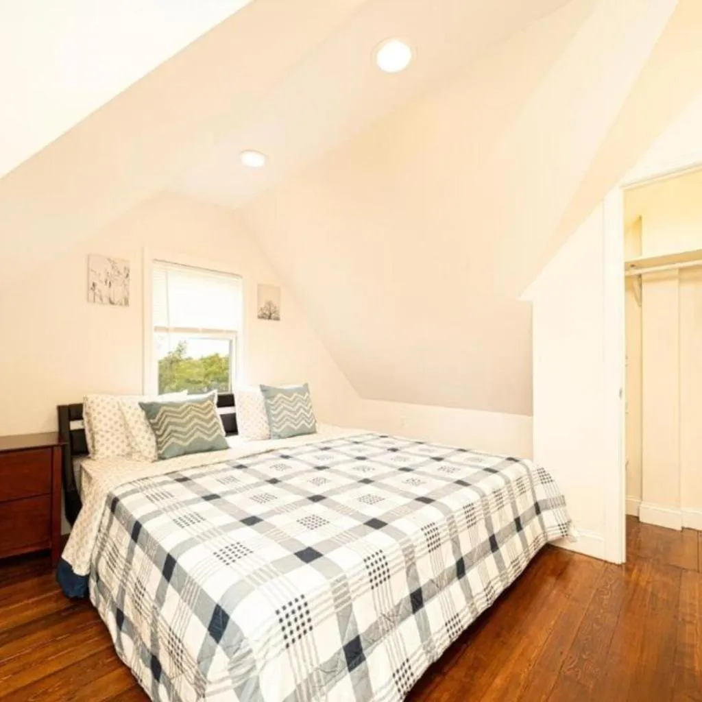 Photograph of Comfortable 4BR Boston Getaway - Pet-Friendly - Near I-93 & Red Line 988
