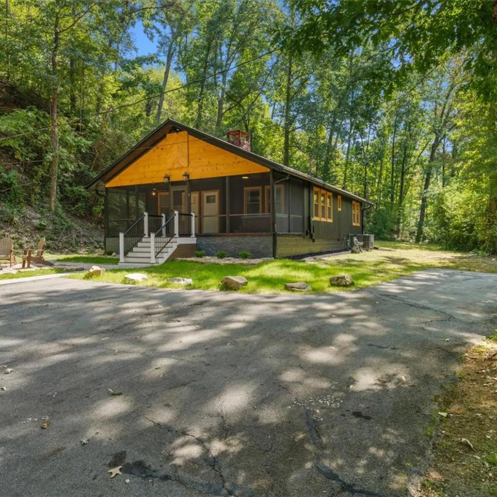 Photograph of Hill Top Forest Cabin with Hot Tub, Fire Pit & Screened Porch