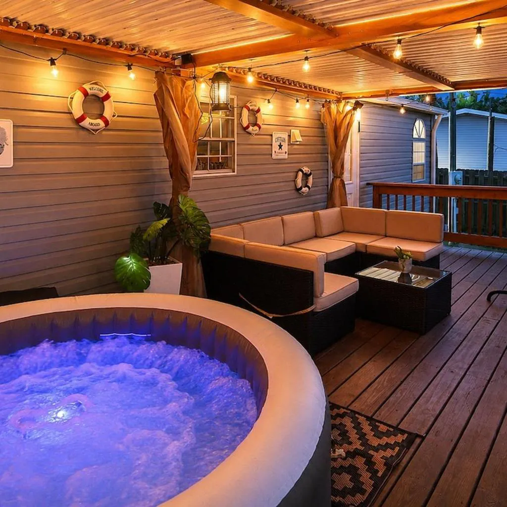 Photograph of Book A Paradise with Jacuzzi, BBQ & Paddleboards