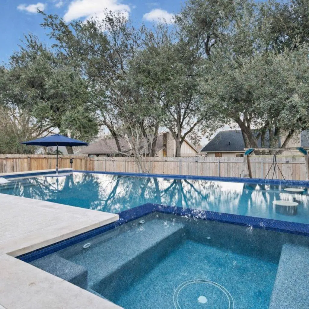 Photograph of Domain Escape 4BR 2.5BA Pool Hot Tub w Game Lounge