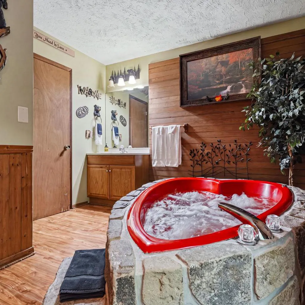 Photograph of Bear Mountain Hollow-FREE Dollywood ticket- cozy cabin with a hot tub, arcade & deck close to town