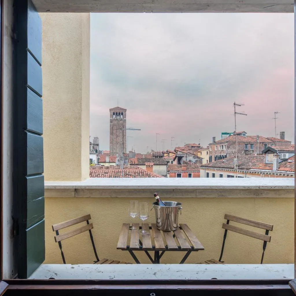 Photograph of Bright Apartment On Venetian Roofs R&R