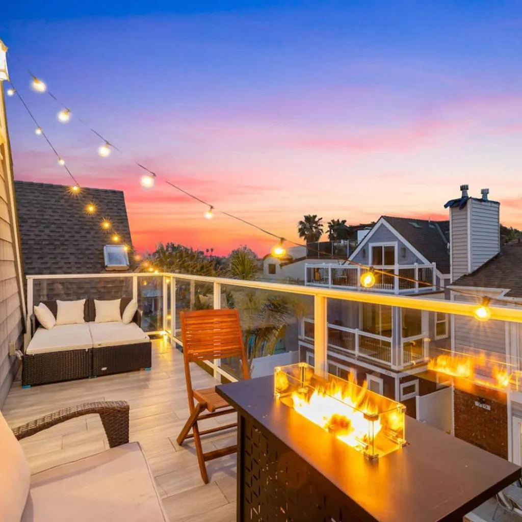 Photograph of Ocean Breeze and Rooftop Views Steps to Surf and Sun