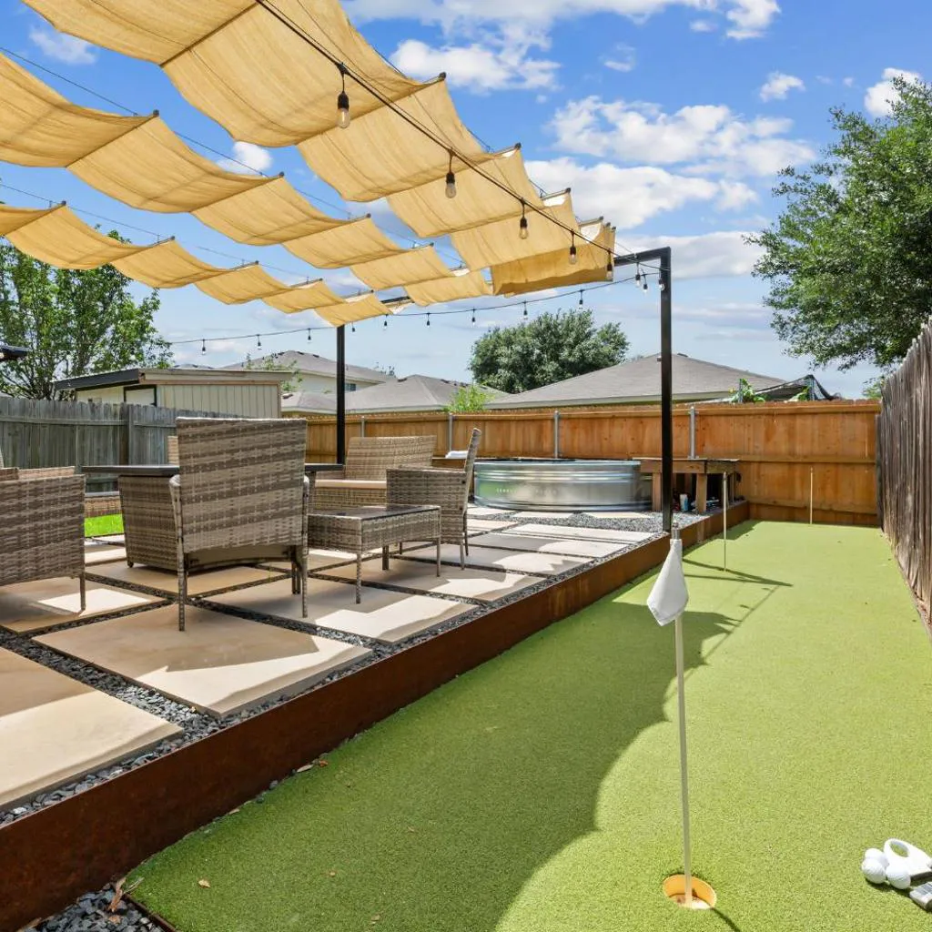 Photograph of Cowboy Pool Fire Pit & Putt Putt Near DT For 10