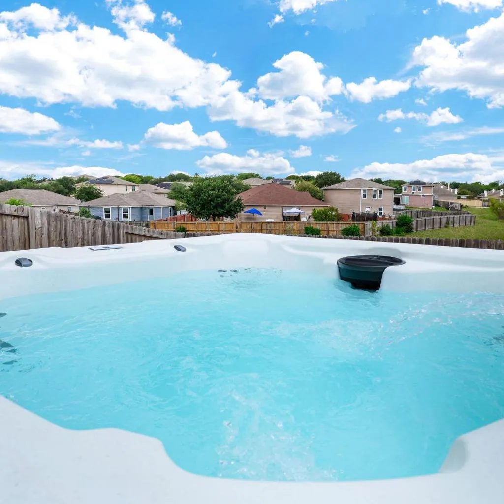 Photograph of Hot Tub Escape Yard BBQ Multi Games Swing Set