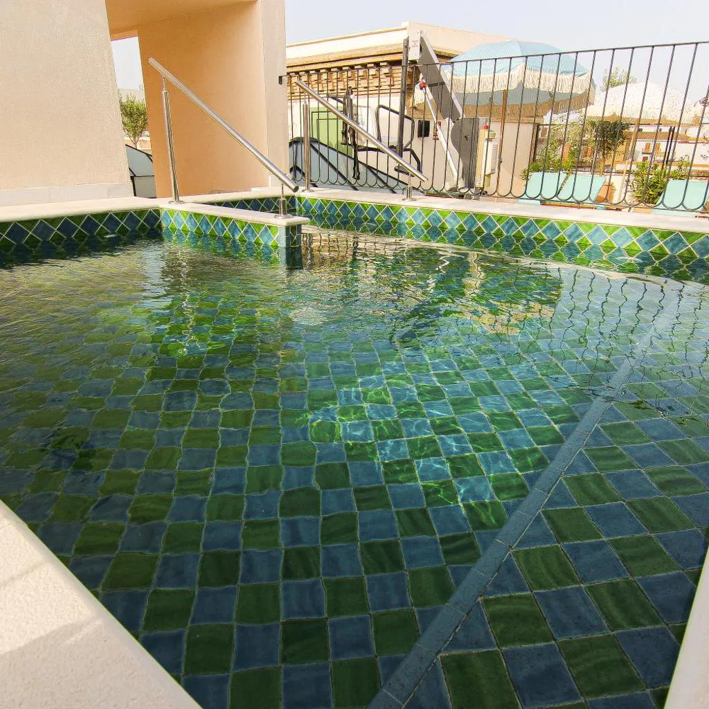 Photograph of Cristine Bedfor Sevilla Boutique Hotel