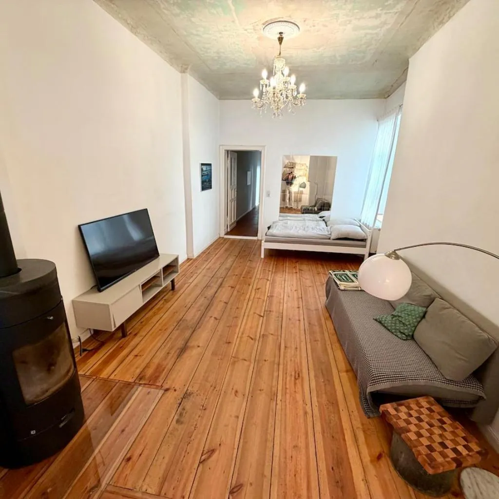 Photograph of Beautiful old-building apartment with fireplace and piano 6 people
