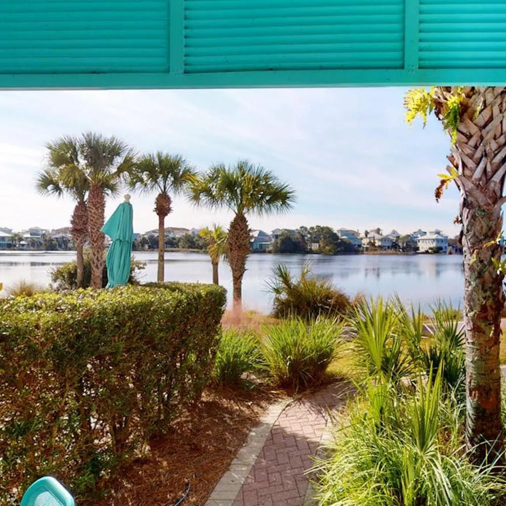 Photograph of Lakefront dog-friendly condo with water views pool hot tub & beach access