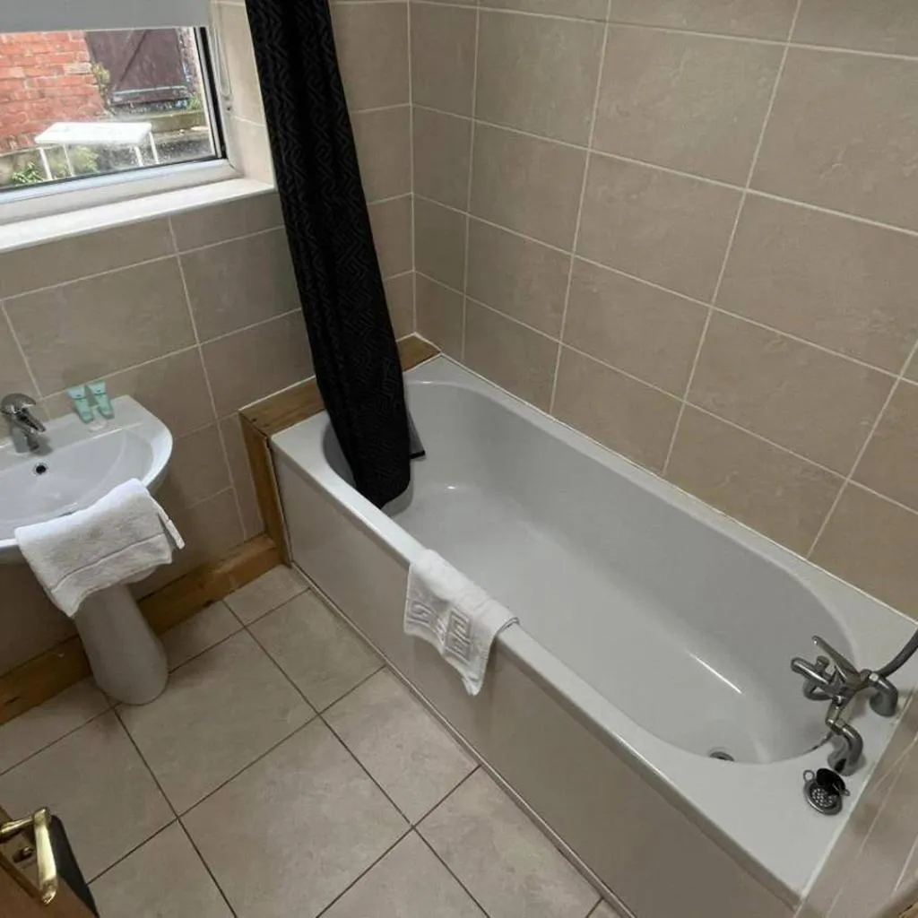 Photograph of Anfield Apartment Sleeps 2 with Garden