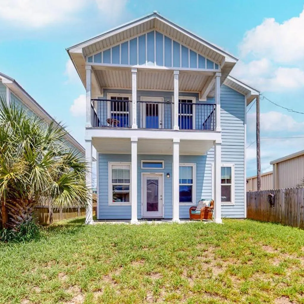 Photograph of Dog-friendly beach house with balcony fenced yard & AC - walk to beach