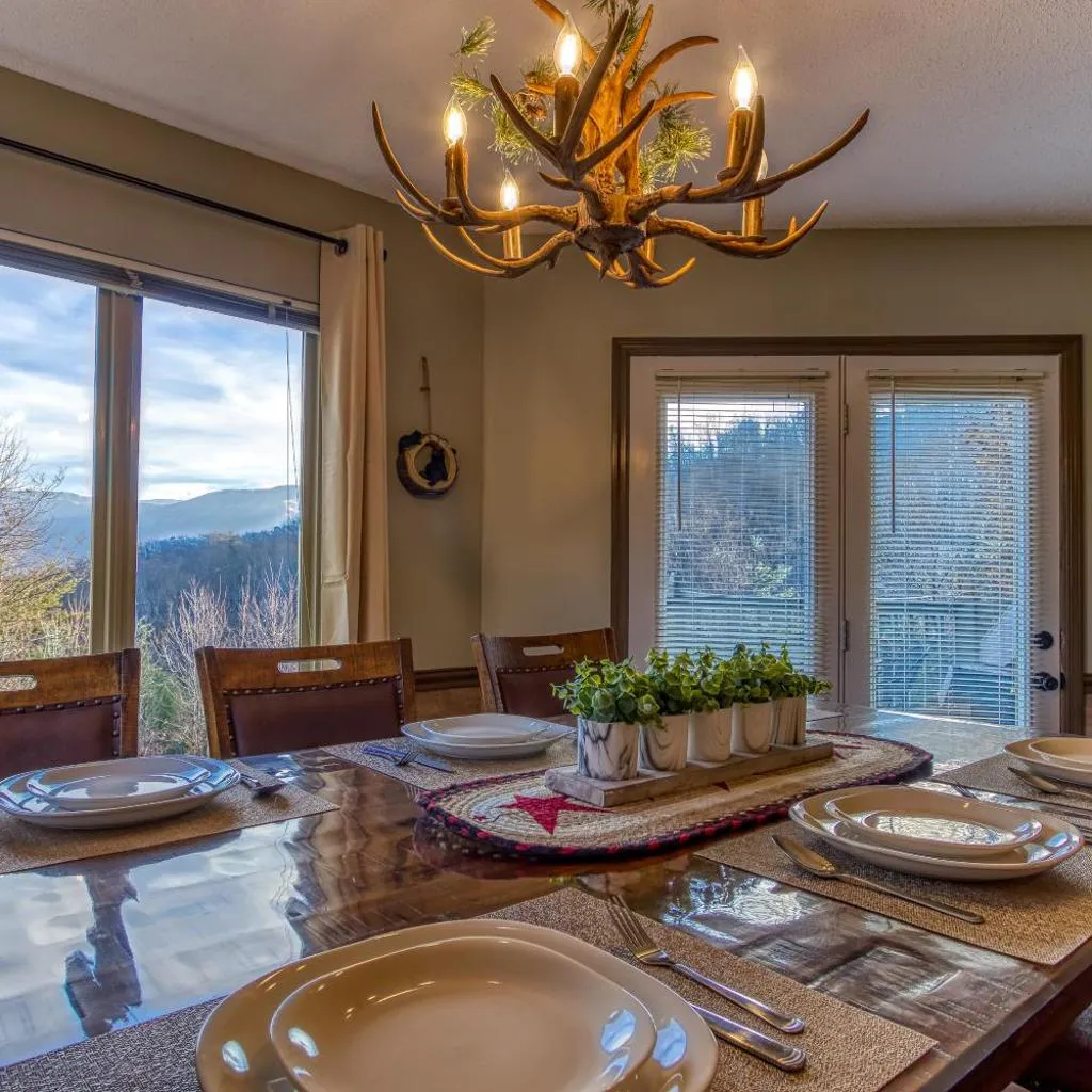 Photograph of 3 Decks, Mtn Views! Tree Tops by HoneyBearCabins - Luxury Rain Showers, 3 King suites, Fireplace, Bear Sightings
