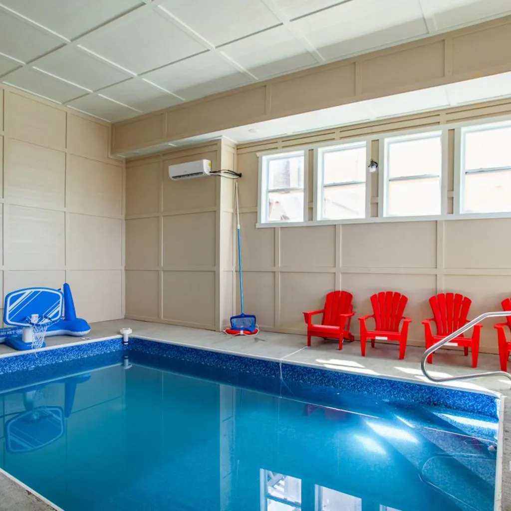 Photograph of Pool and Game Room in Stunning Mountain Cabin