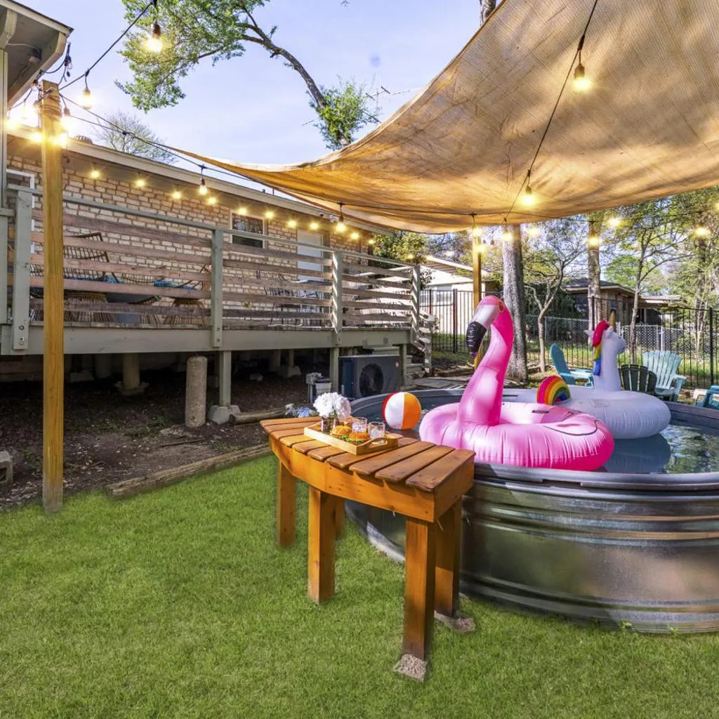 Photograph of Heated Pool Game Room Firepit Domain Q2 Stadium