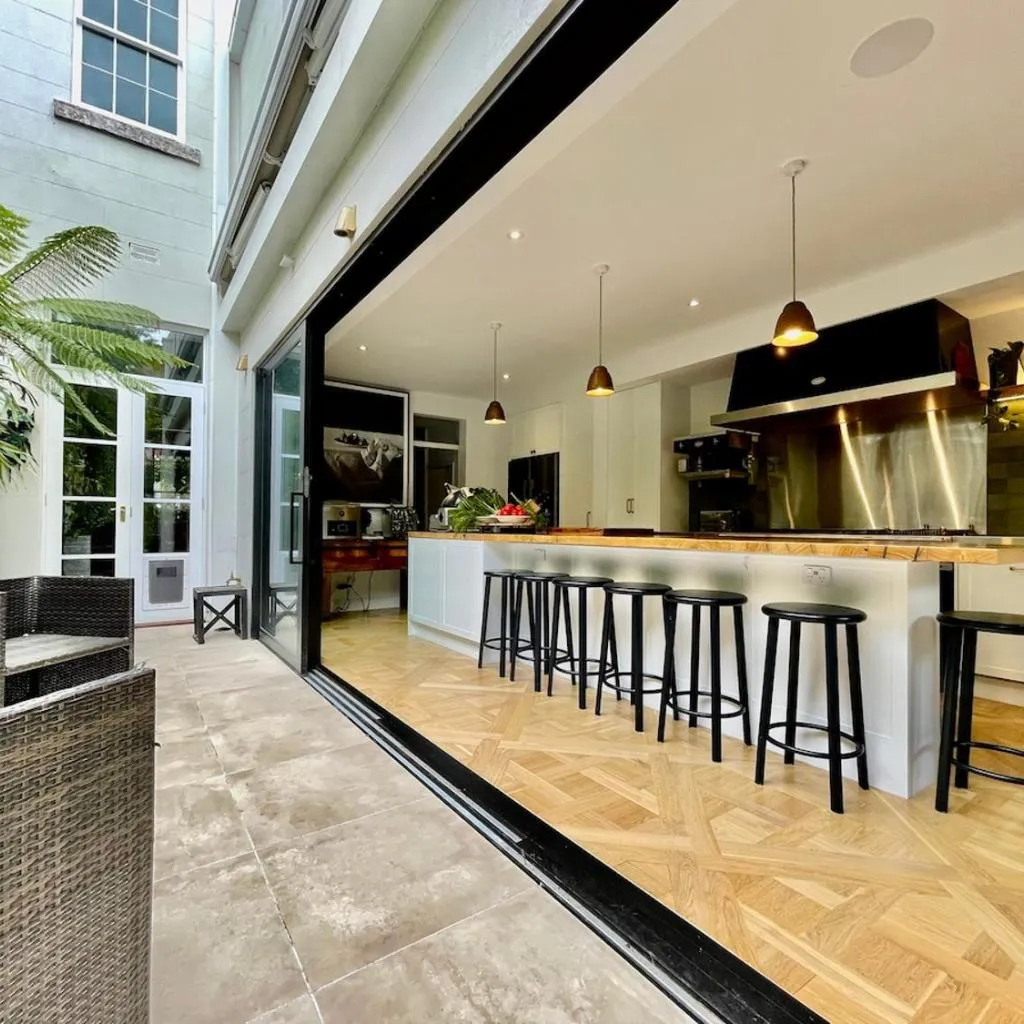 Photograph of A Truly Exceptional Heritage Residence Private Luxury by St Kilda Beach with swimming pool