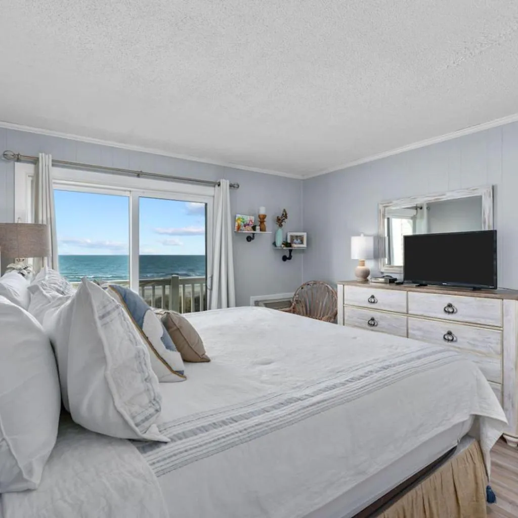 Photograph of Direct Beach Access. Pets welcome. Oceanfront Condo with Pool - Stunning Views