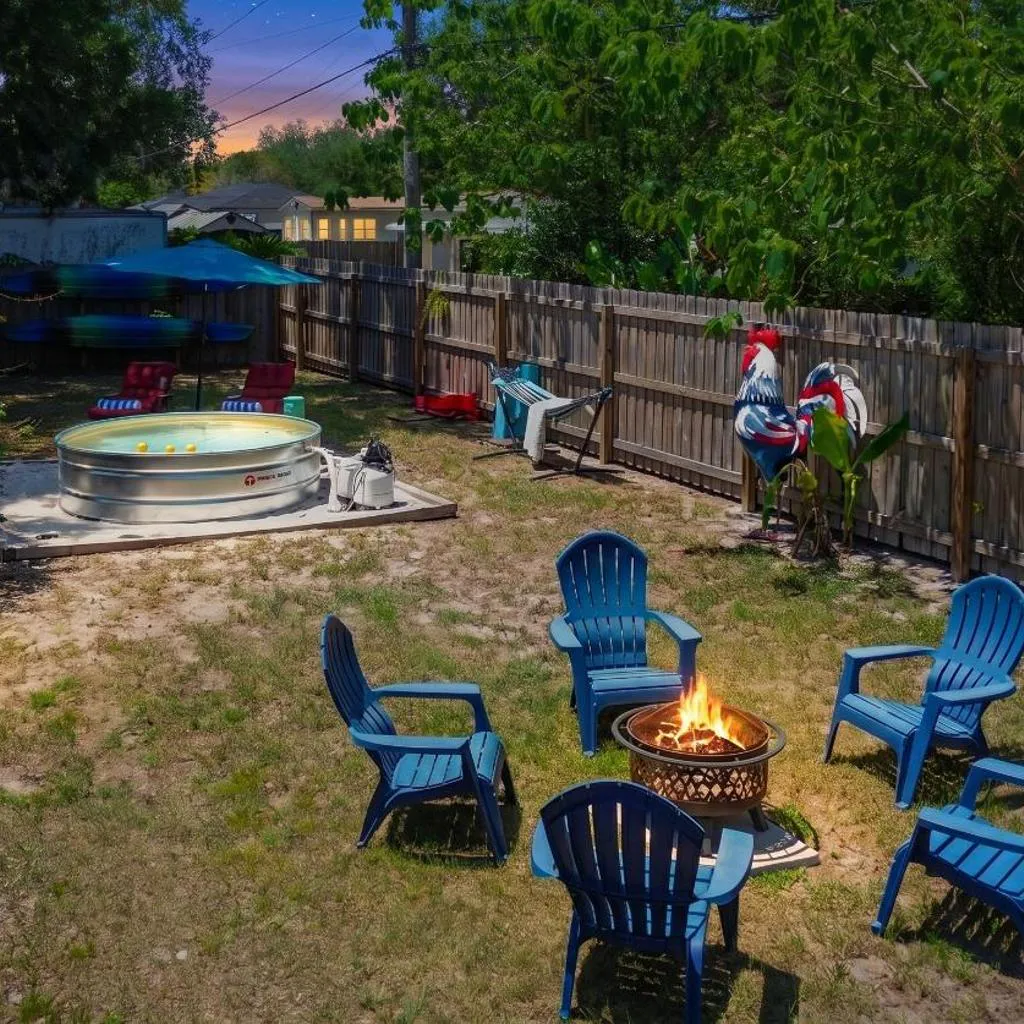 Photograph of Spacious 4 bedroom 3 bath Clearwater Vacation House Cowboy Pool Fire Pit Games Close to Clearwater Beach Biking Trail Farmers Markets Harbor Health Spa Baycare Ballpark and Ruth Eckerd Hall Golf Courses