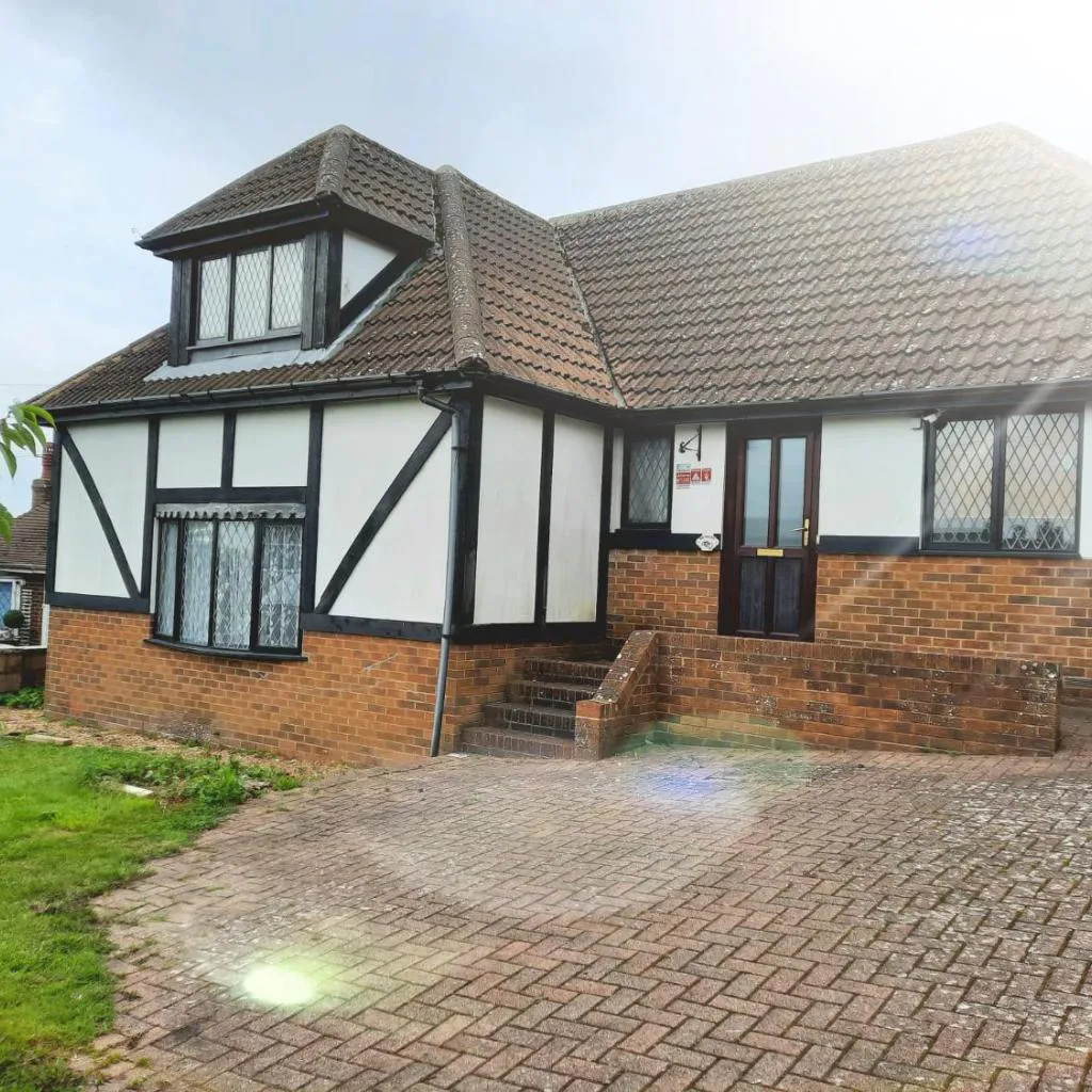 Photograph of Modern Tudor home, sea views