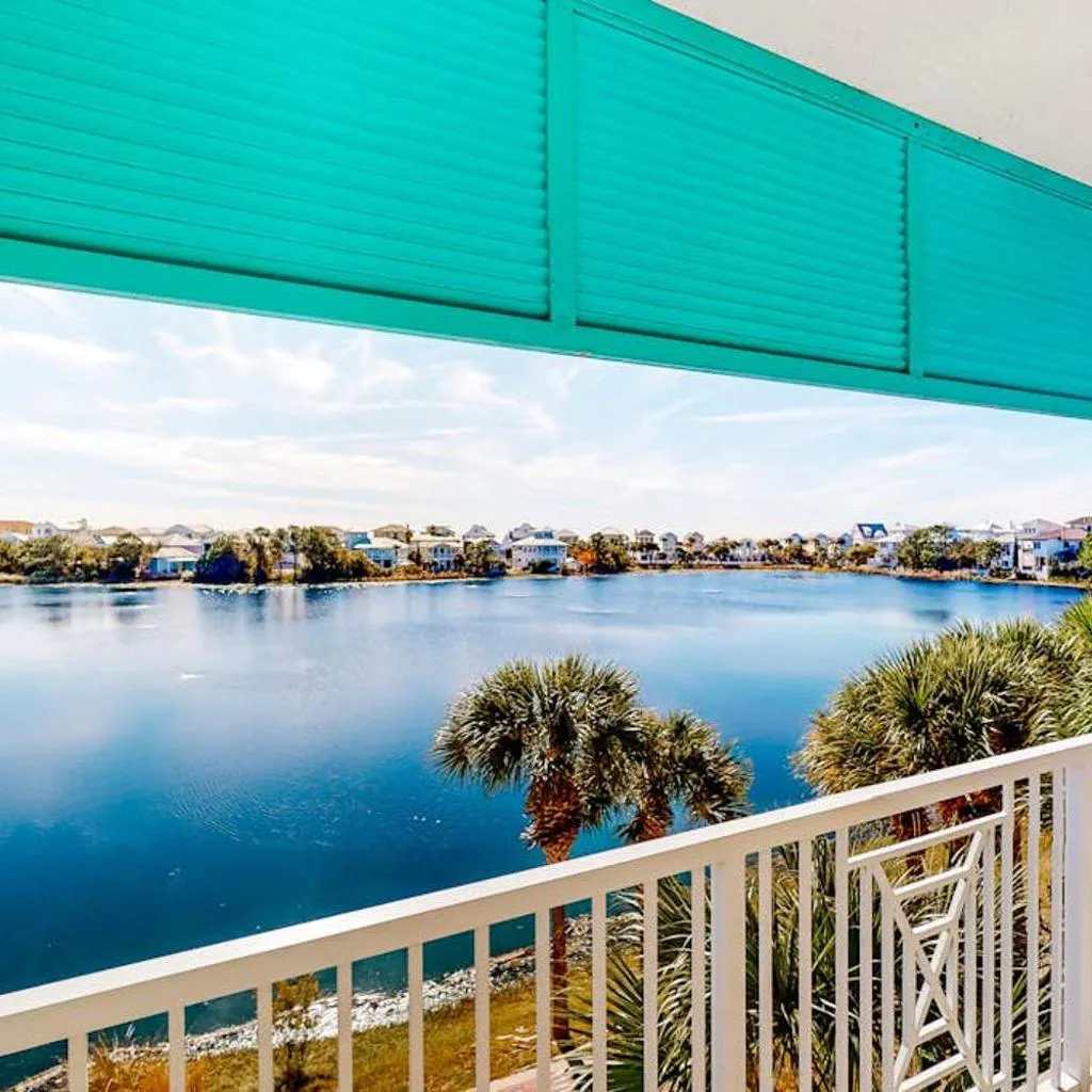 Photograph of Sunset-view dog-friendly condo w balcony overlooking water beach access pool & hot tub