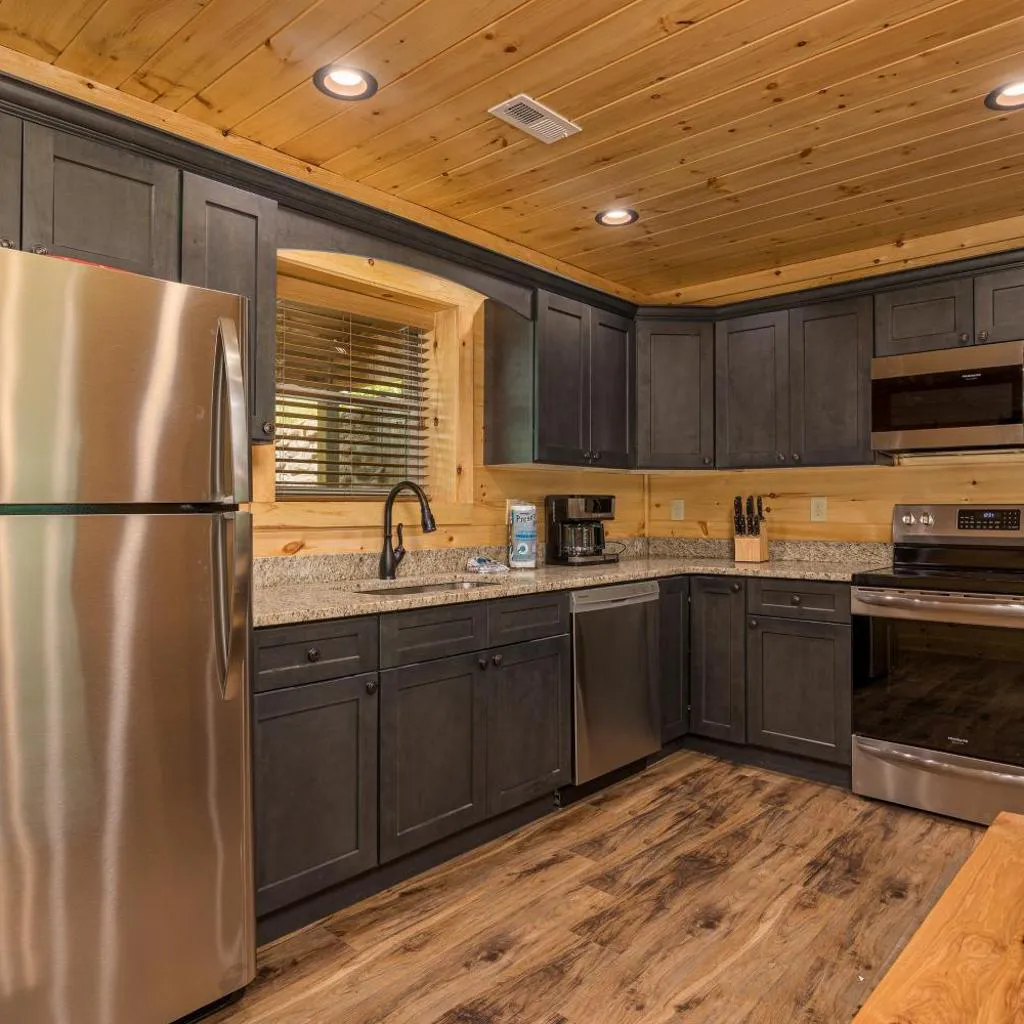 Photograph of Hidden Gem Cabin for up to 10 with Wi-Fi, game room, hot tub and swim spa, close to town, private