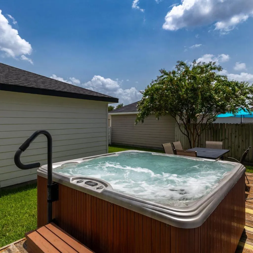Photograph of Htown Getaway Hot Tub Game Room Fire Pit Sleeps 16