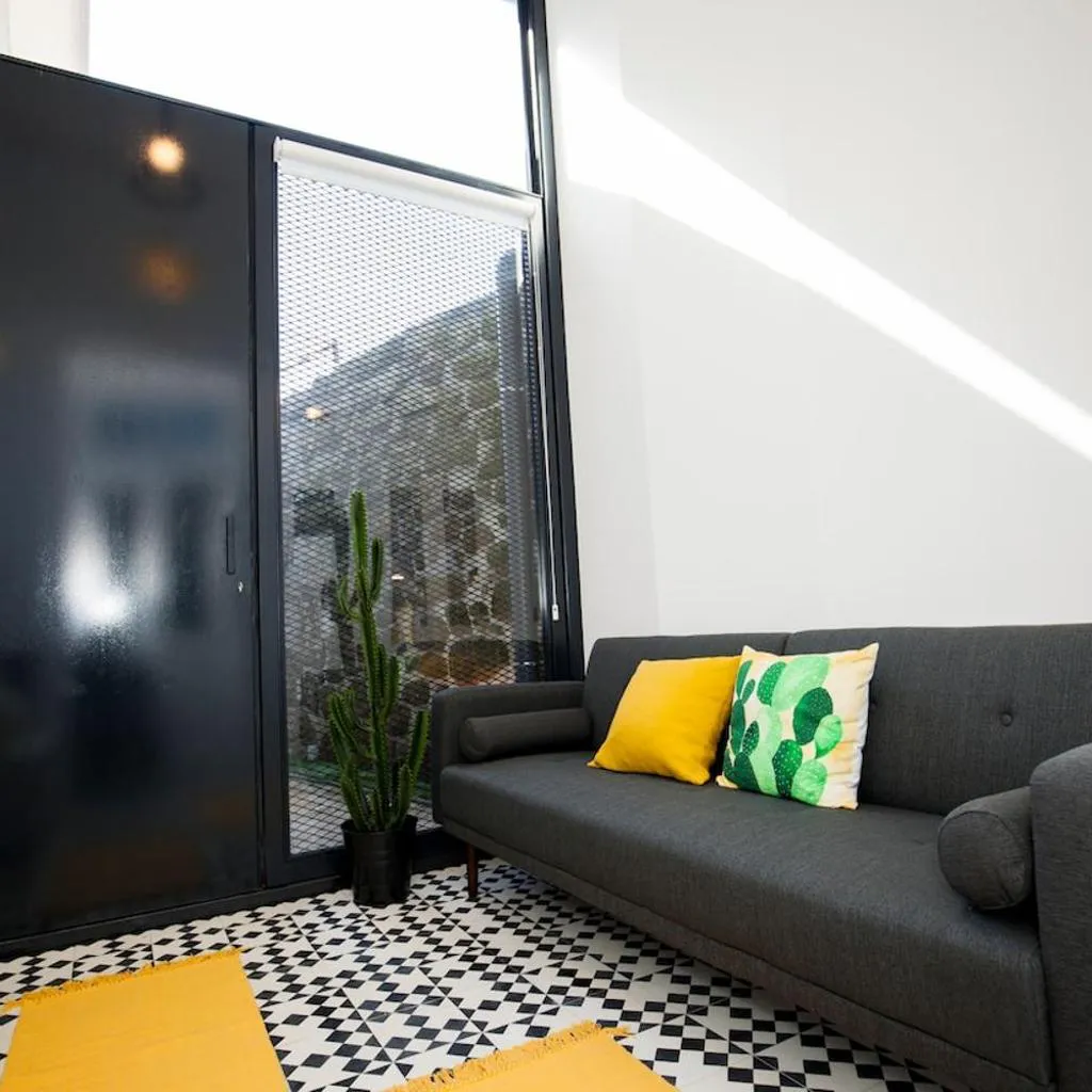Photograph of GET a Cactus and Books studio