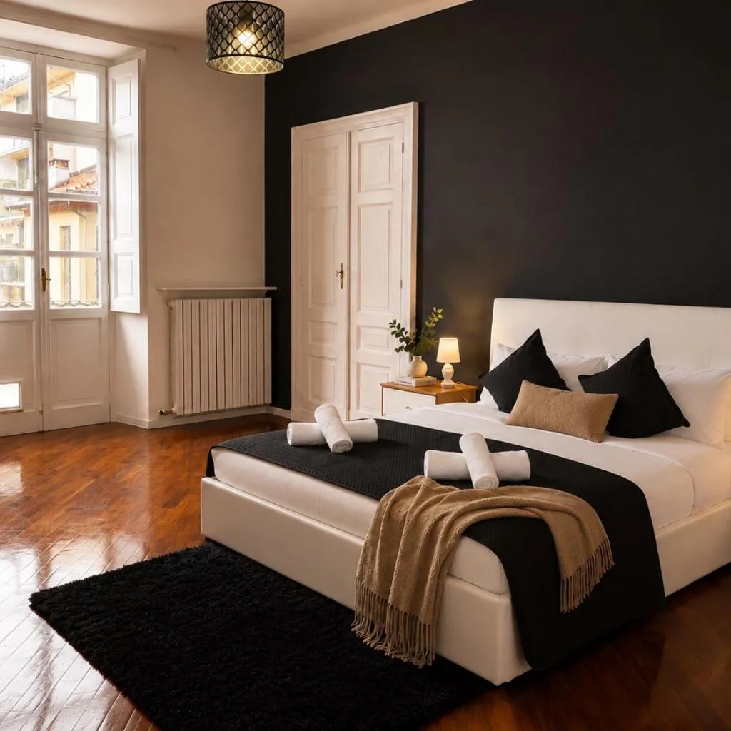 Photograph of Suite Cernaia- Spazioso appartamento in Centro Torino- 2 camere-7 posti letto