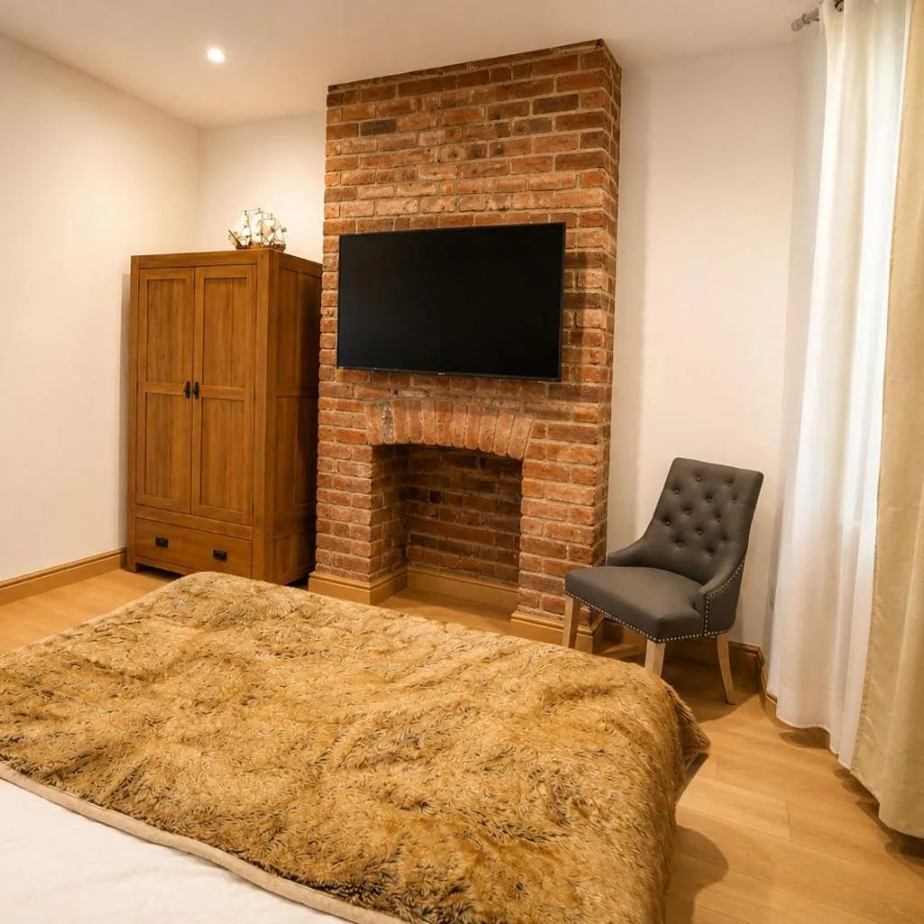 Photograph of SidemerseyLivings - Step-Free 4BR Home, Ground Floor Bed & Bath, Private Gated Parking