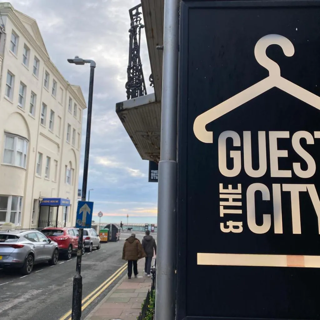 Photograph of Guest And The City
