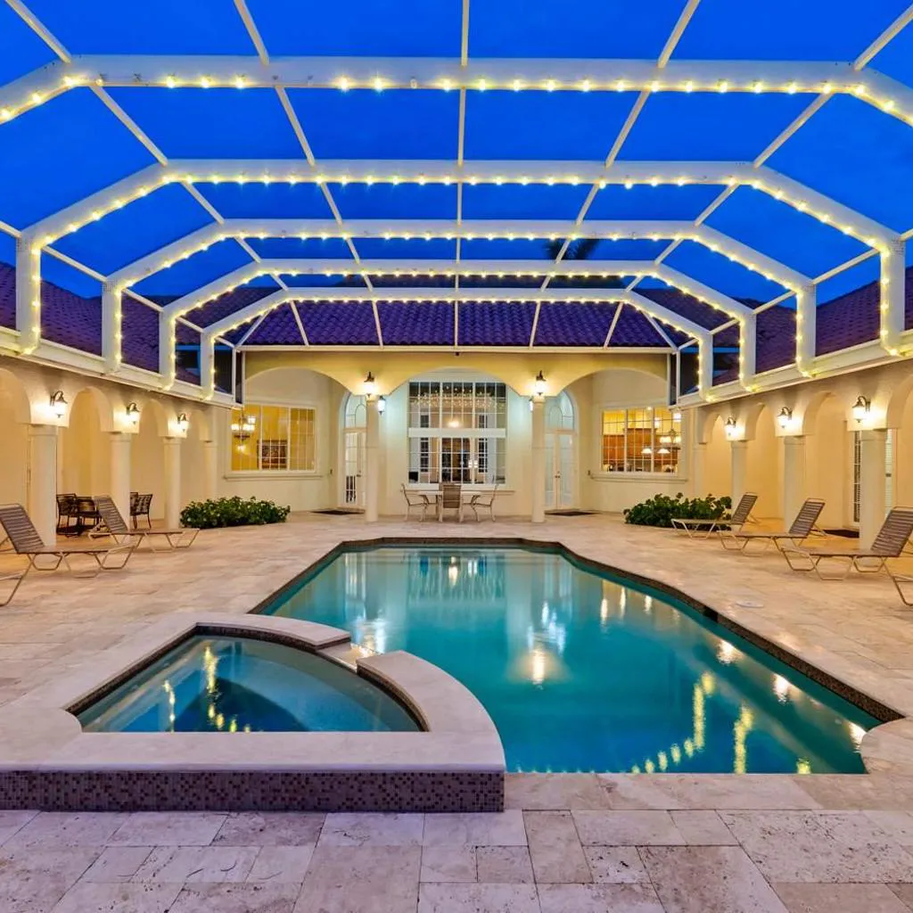 Photograph of Knickerbocker Estate - Exclusive 9 BR Getaway in Naples! Enjoy Private Pool, Outdoor Dining and Expansive Grounds Experience Tranquility with Easy Access to Naples Best!