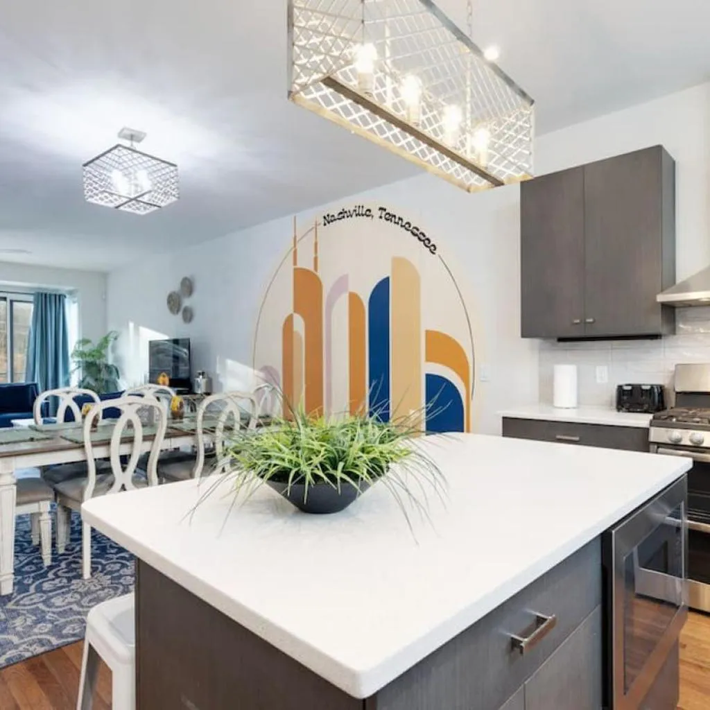 Photograph of Modern Townhome, Large Game Room, 10min to Downtown! Sleeps 10!