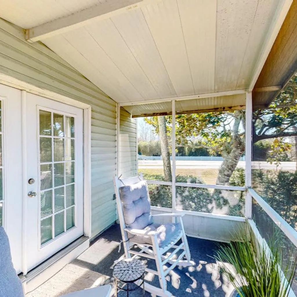 Photograph of Dog-friendly townhouse near the beach with outdoor pool water views & AC